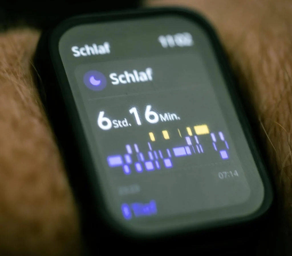 A smartwatch displaying health and fitness metrics