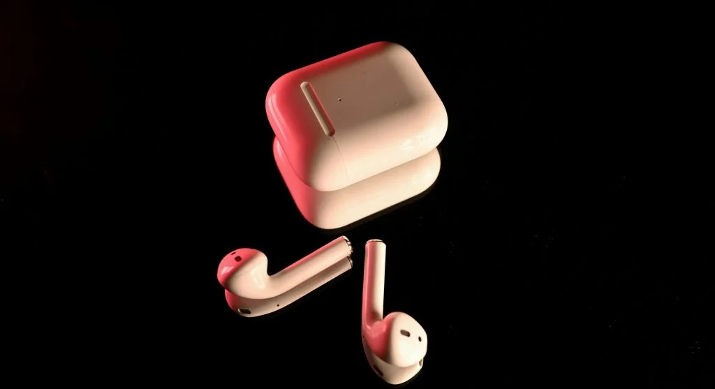 woman testing earbuds sound quality
