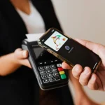 Smartphone making contactless payment using NFC