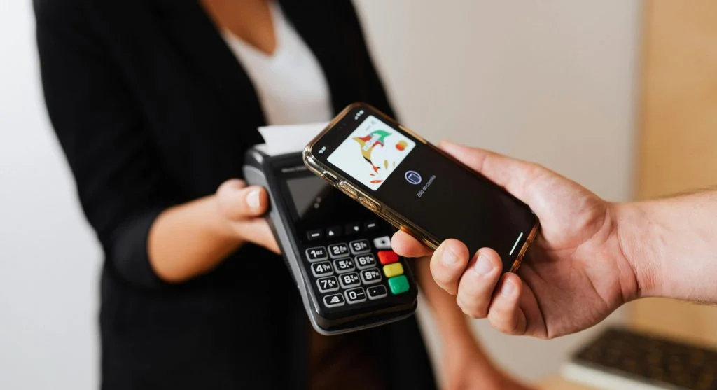 Smartphone making contactless payment using NFC